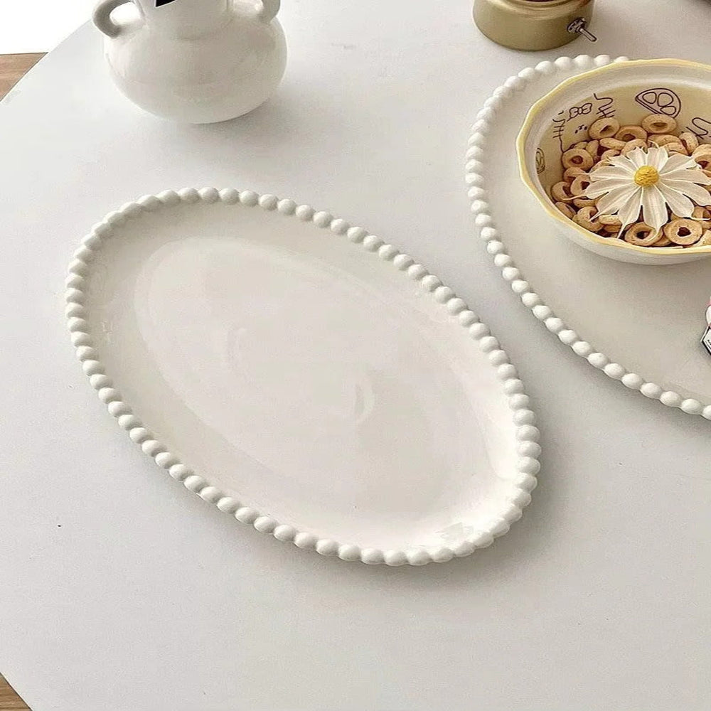 Dinnerware Set with Beaded Rim and Ceramic Design