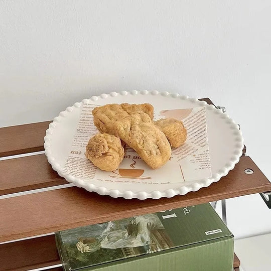 Dinnerware Set with Beaded Rim and Ceramic Design